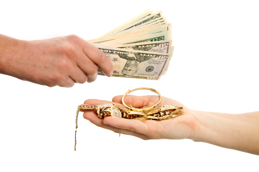 handing money to a pawnbroker for cash